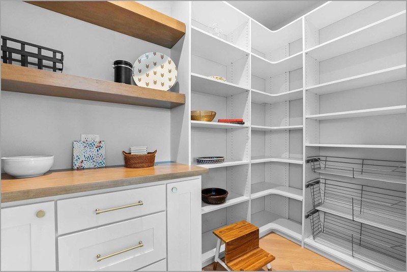 Custom pantry design with organized food sections